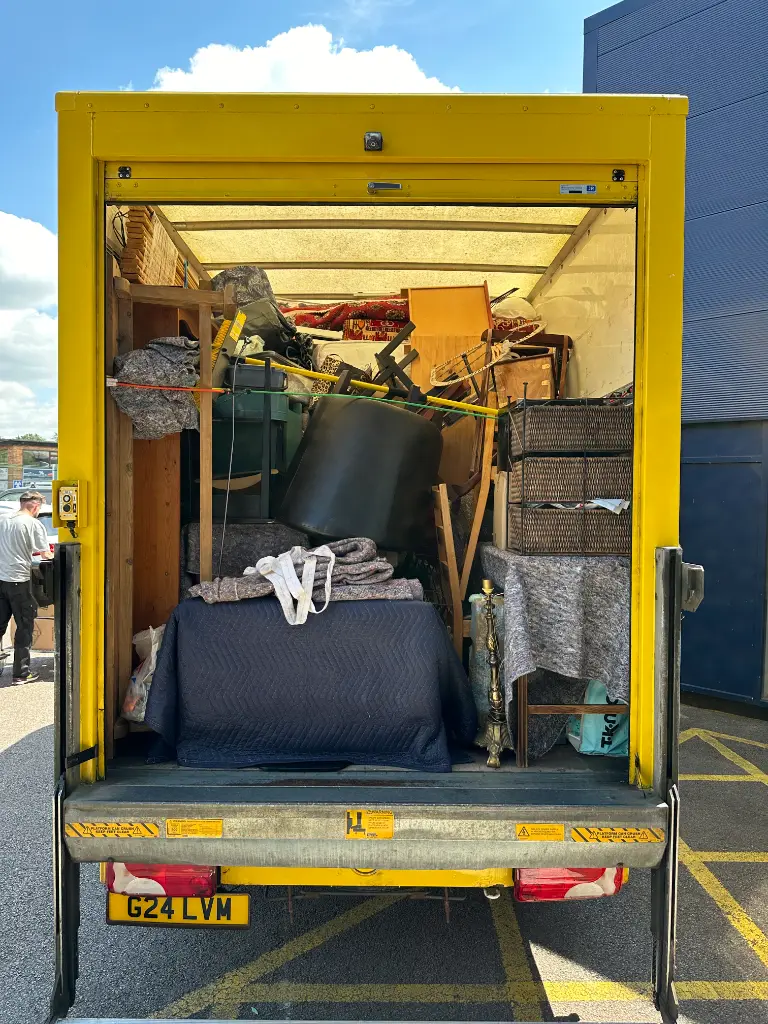 Removals Leighton Buzzard van fully loaded with furniture and blankets during a house clearance